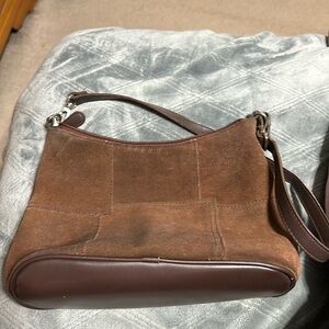 1 small brown purse.